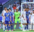 من مواجهة منتخب العراق أمام اليابان في كأس آسيا 2024 (Facebook/IFA) وين وين winwin