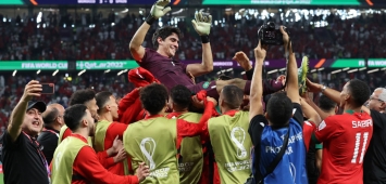 احتفال لاعبي المنتخب المغربي بالفوز على إسبانيا (Getty) ون ون winwin