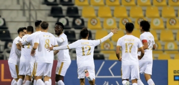احتفال لاعبي نادي قطر بالفوز على العربي (Getty)