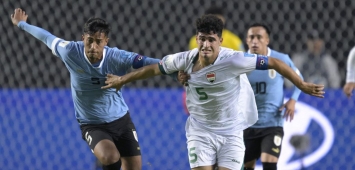 جانب من مواجهة العراق وأوروغواي ضمن منافسات المجموعة الخامسة من كأس العالم للشباب (Getty) ون ون winwin