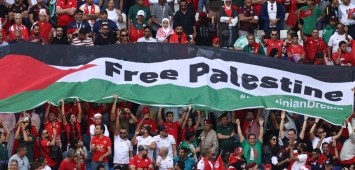 أرشيفية - علم فلسطين الحرة يرفرف عالياً في مونديال قطر 2022 (Getty) وين وين winwin