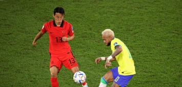 لاعب منتخب كوريا الجنوبية جونهو سون في منافسة مع البرازيلي نيمار ضمن مواجهة المنتخبين في مونديال قطر 2022 على ملعب 974 (Getty) وين وين winwin
