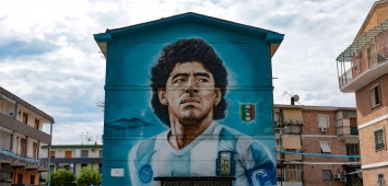 جرافيتي أسطورة الأرجنتين ونابولي دديغو أرماندو مارادونا في نابولي (Getty)