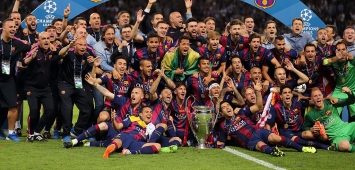 أرشيفية | احتفال لاعبي برشلونة بلقب دوري أبطال أوروبا موسم 2014/15 (Getty)