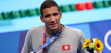 من تتويج السباح التونسي أحمد أيوب الحفناوي بالميدالية الذهبية في دورة الألعاب الأولمبية طوكيو 2020 ون ون winwin
