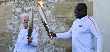 كل ما تريد معرفته عن الشعلة الأولمبية قبل انطلاق أولمبياد باريس 2024 - Olympic torch ون ون winwin AFP