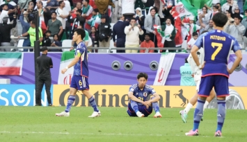 حسرة كبيرة انتابت لاعبي اليابان عقب صافرة النهاية (Getty)