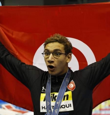السباح أحمد أيوب الحفناوي أحد الأبطال الذين رفعوا راية تونس في الألعاب الأولمبية (Getty) وين وين winwin