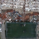 منظر جوي لحطام مباني منهارة بمحيط ملعب في تركيا