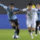 جانب من مواجهة العراق وأوروغواي ضمن منافسات المجموعة الخامسة من كأس العالم للشباب (Getty) ون ون winwin