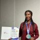 القطرية نور نزار تحتفي بفوزها بالميدالية الفضية في بطولة العالم الشاطئية للتايكوندو (QNA)