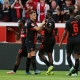 Leverkusen players celebrate their big victory over rookie Heidenheim (Getty) One Win Winwin