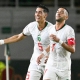 فرحة لاعبا منتخب المغرب حكيم زياش ونايف أكرد بالفوز على زامبيا (Getty) ون ون winwin